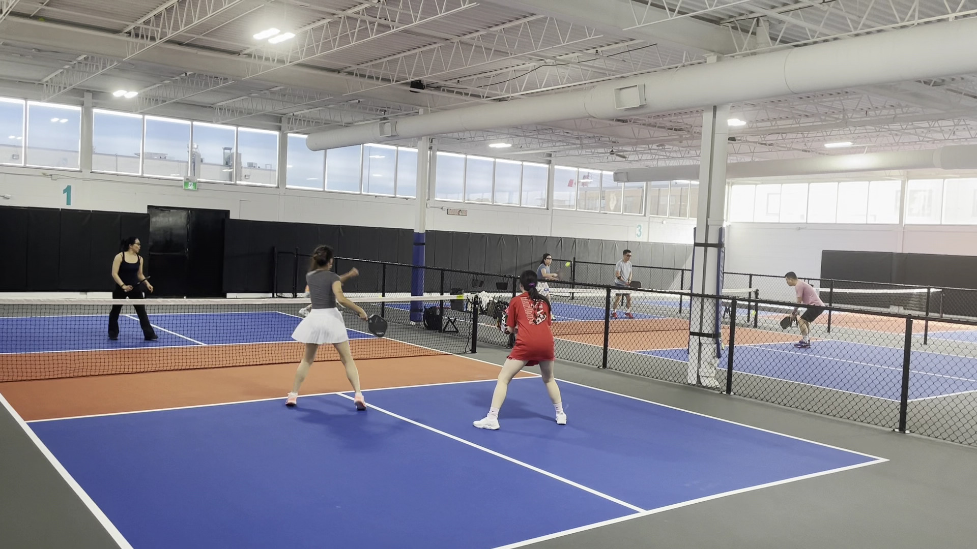 Pickleball play at 20 Castlefield Avenue Park, Toronto