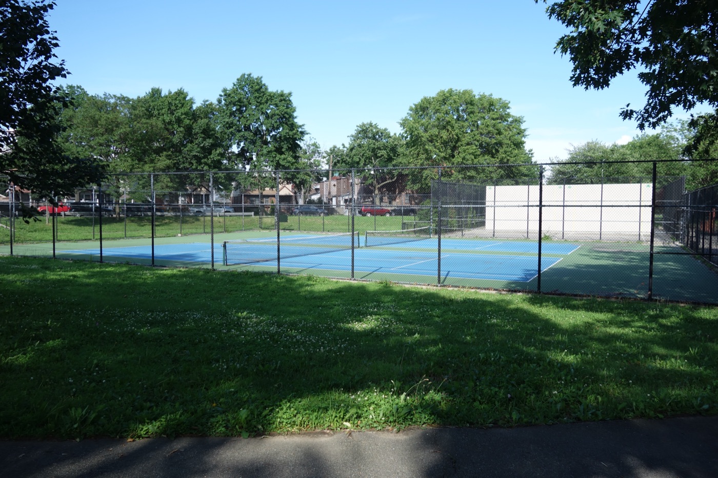 Outdoor tennis court setting — representative view for Burrard View Park, Vancouver