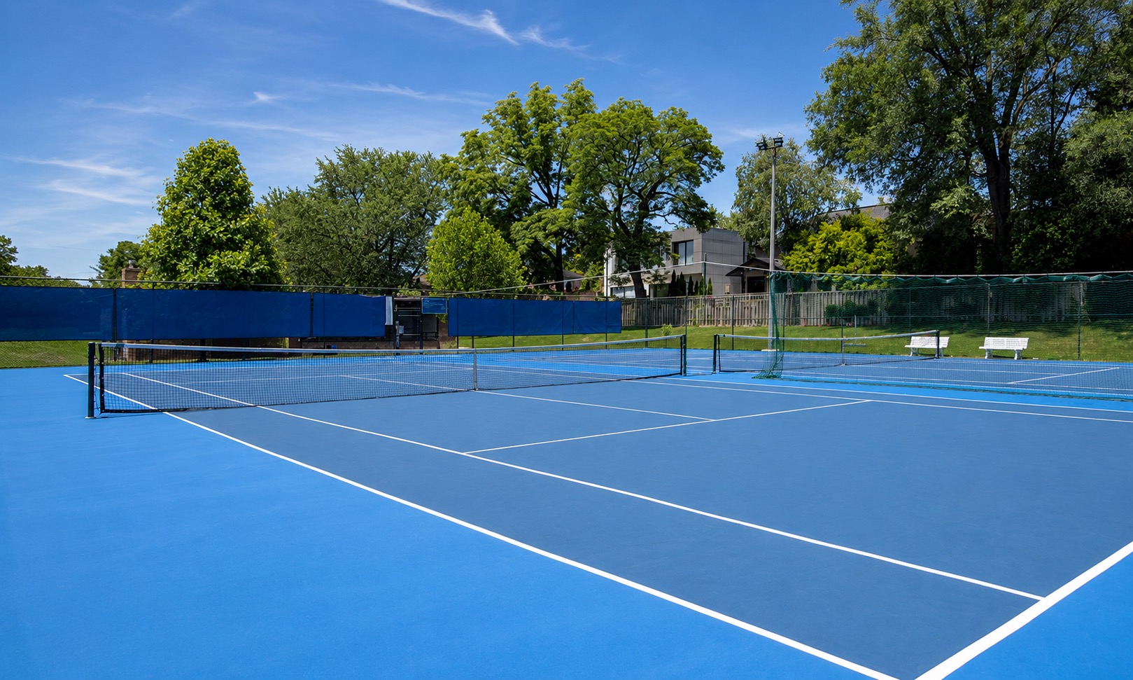 Outdoor pickleball courts at Bennington Heights Park — empty court overview, Toronto