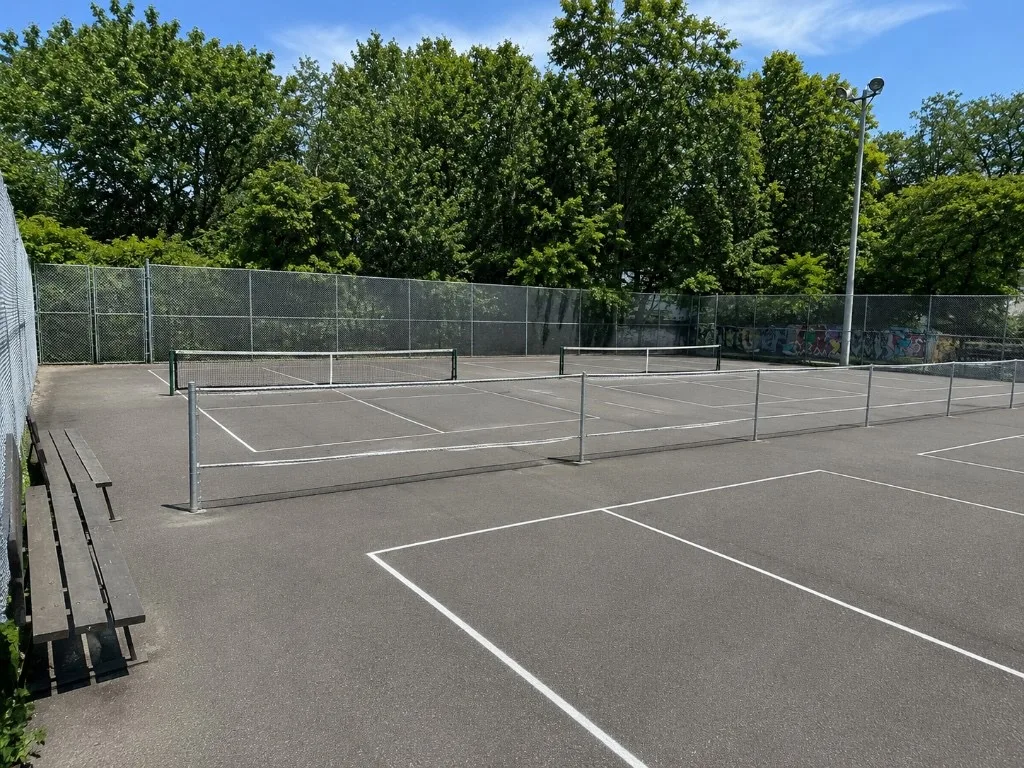Outdoor pickleball courts at Birchmount Park — empty court overview, Toronto
