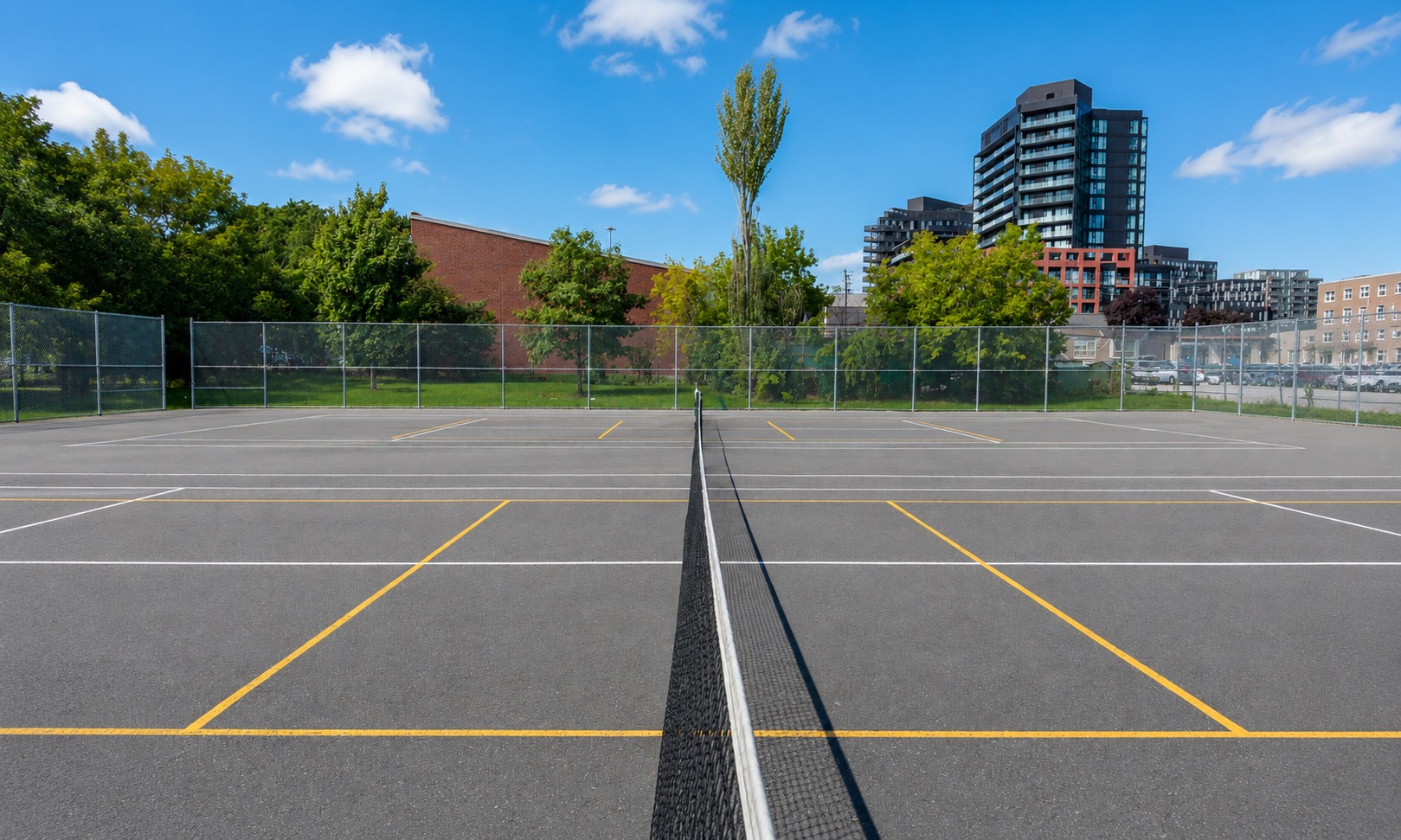 Outdoor pickleball courts at Champlain Parkette — empty court overview, Toronto