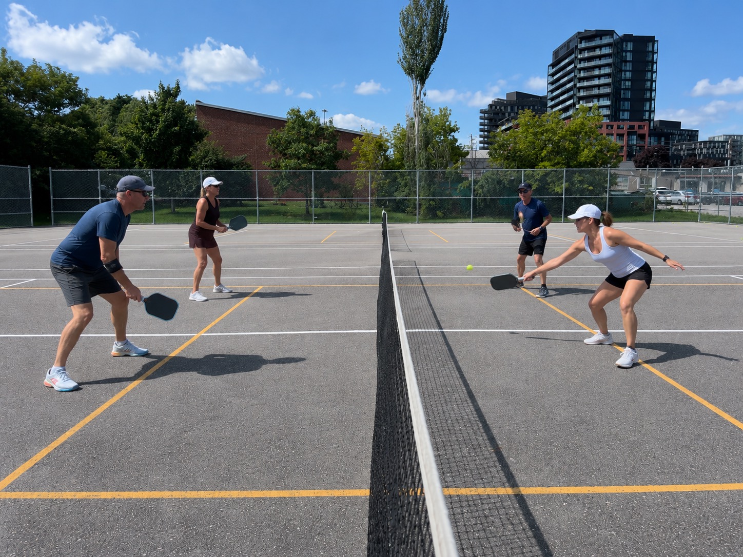 Pickleball play at Champlain Parkette, Toronto