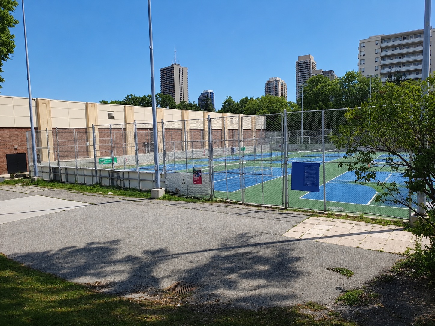 Outdoor pickleball courts at Eglinton Park — empty court overview, Toronto