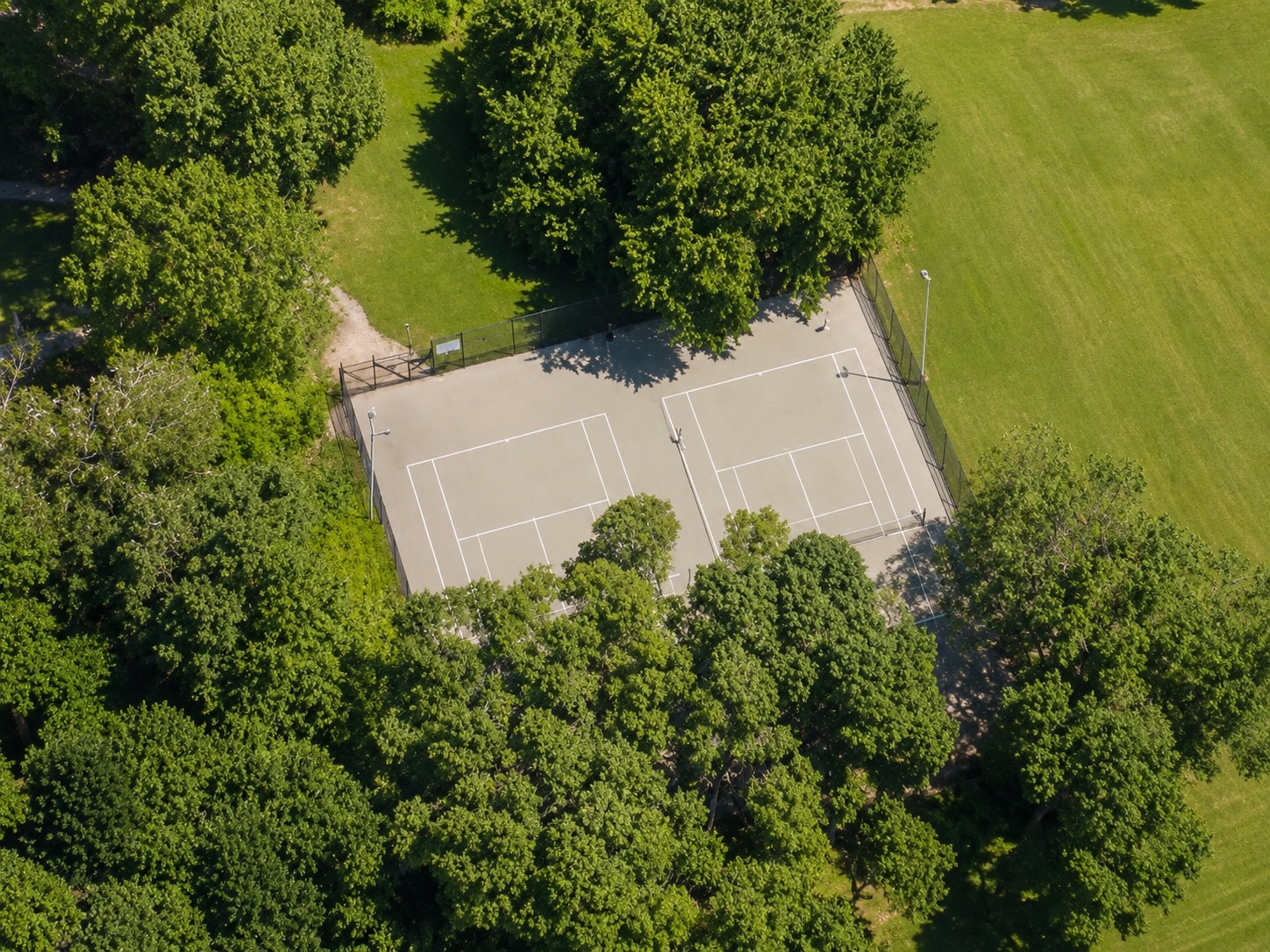 Outdoor pickleball courts at Jeff Healey Park — empty court overview, Toronto