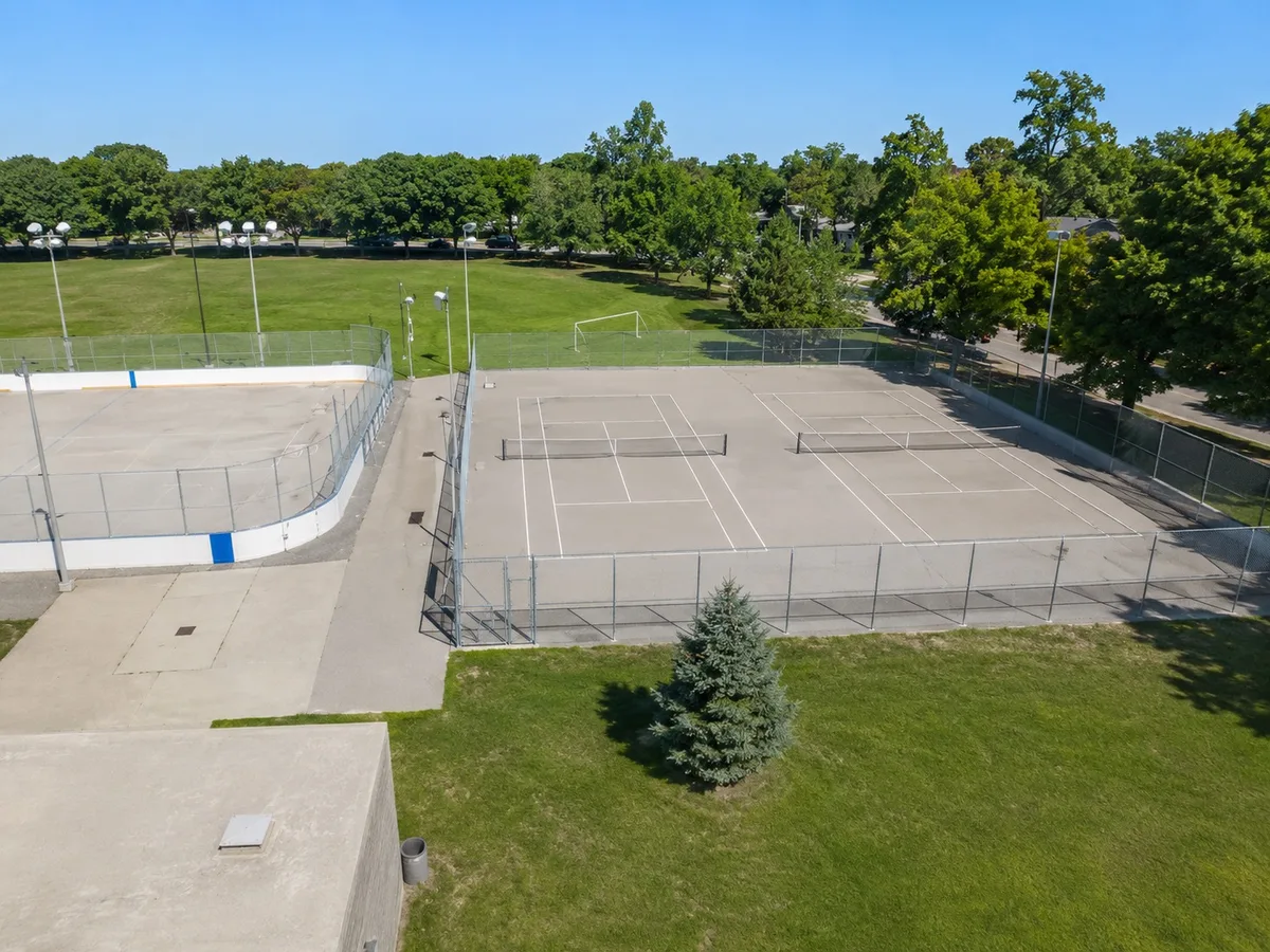Outdoor pickleball courts at Jimmie Simpson Park — empty court overview, Toronto