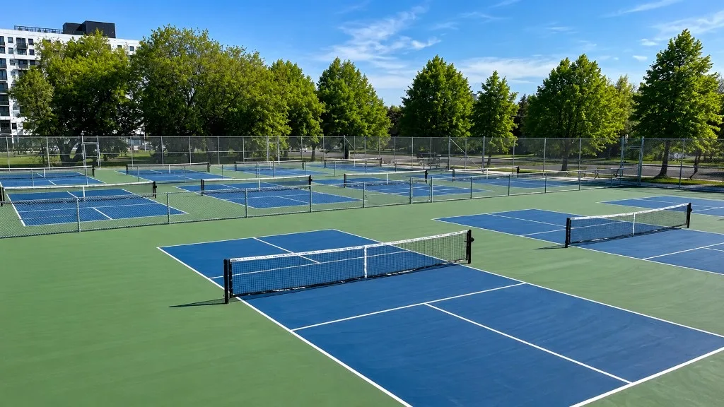 Outdoor pickleball courts at Main Sewage Treatment Playground — empty court overview, Toronto