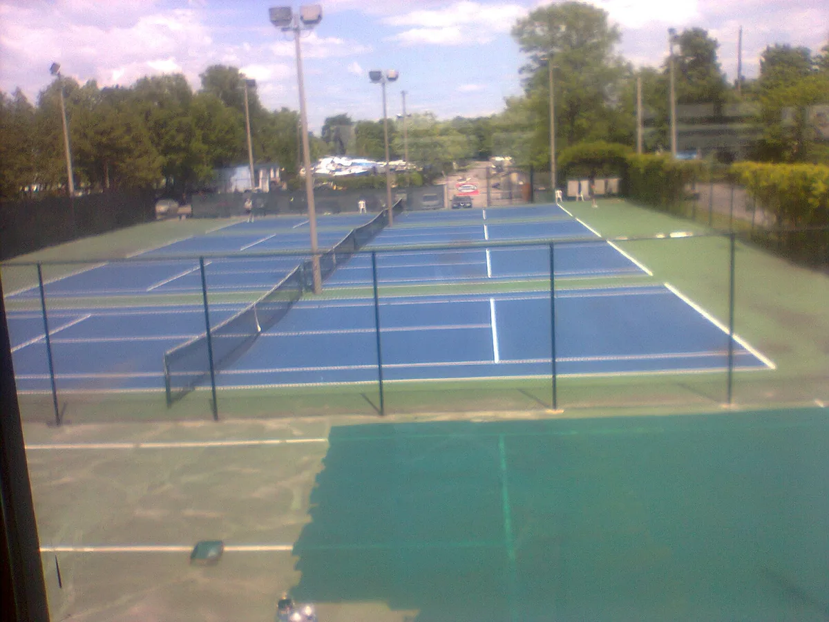 Britannia Park — Tennis Centre West Ottawa — outdoor court photo (Wikimedia Commons)