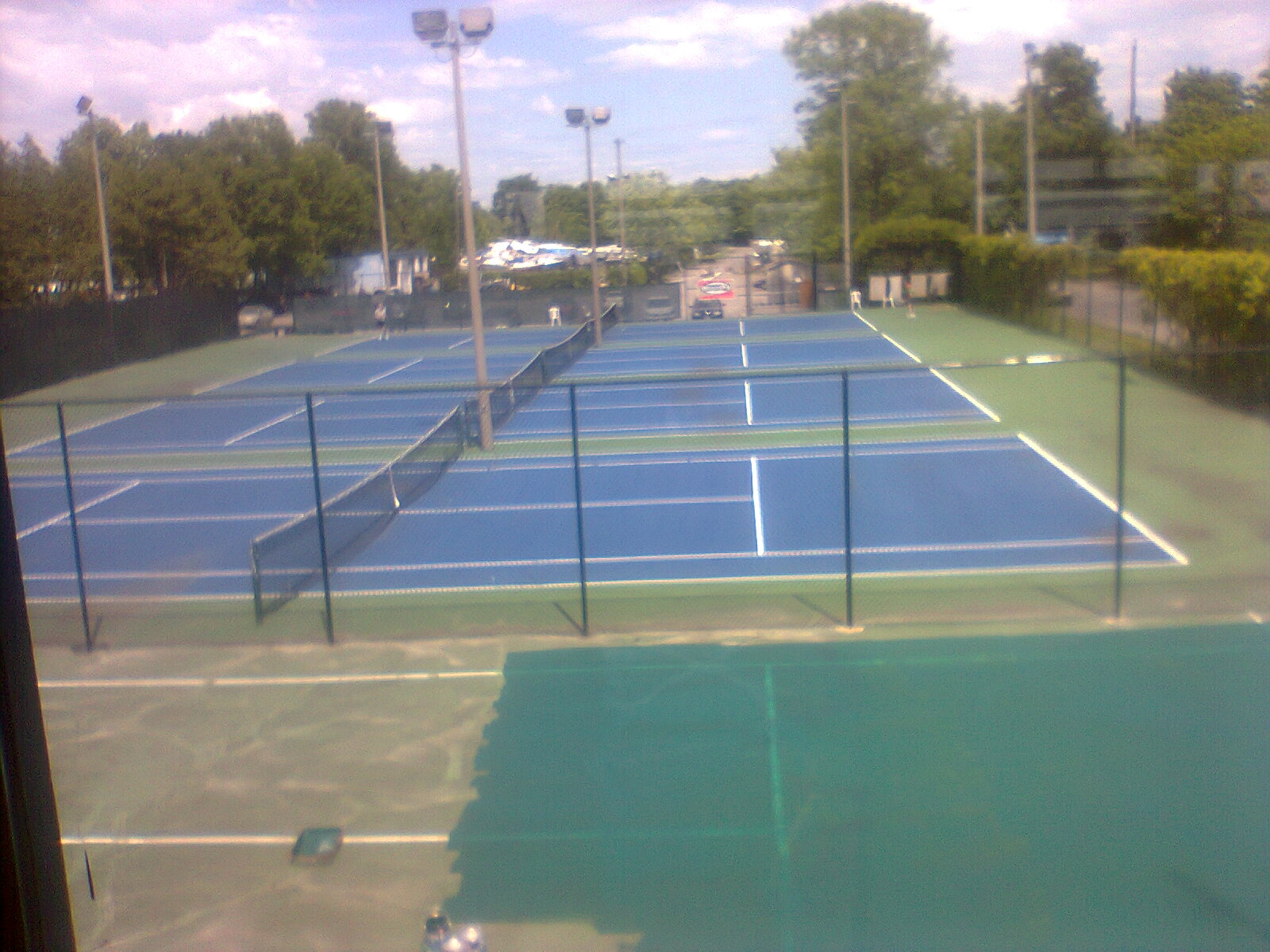 Britannia Park — Tennis Centre West Ottawa — outdoor court photo (Wikimedia Commons)